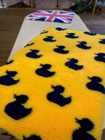 Yellow ducks pattern vet bedding