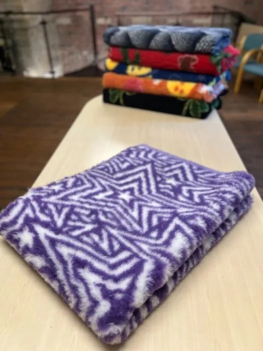 Finished rolls of patterned vet bedding at the mill