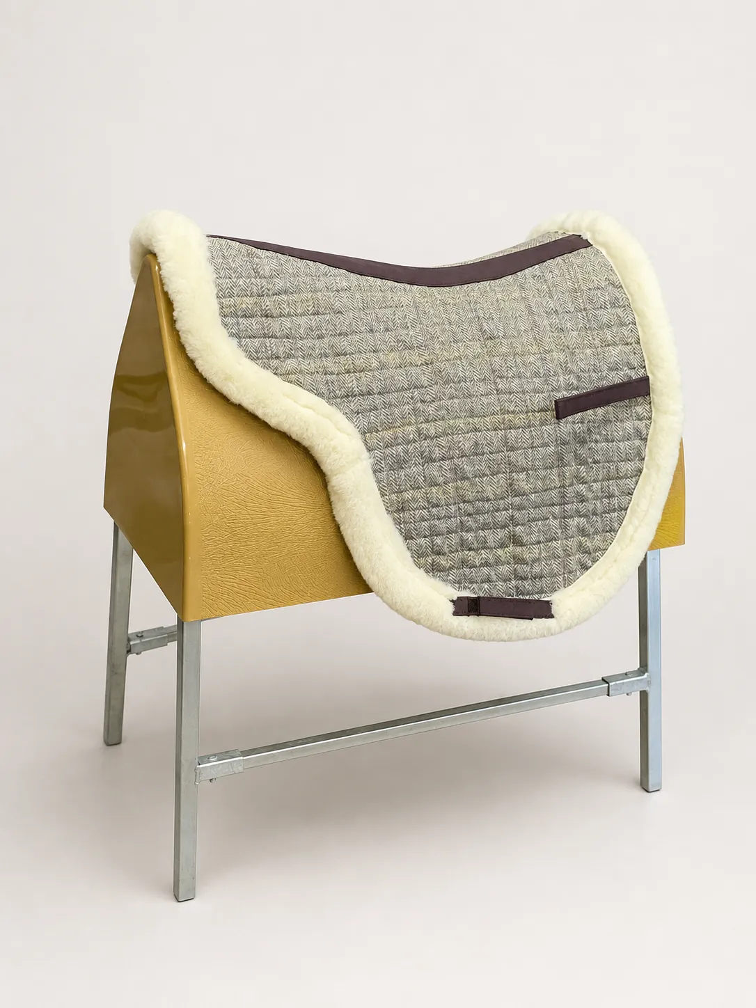 British wool and Harris tweed saddle pad with a sheepskin-style pile lining
