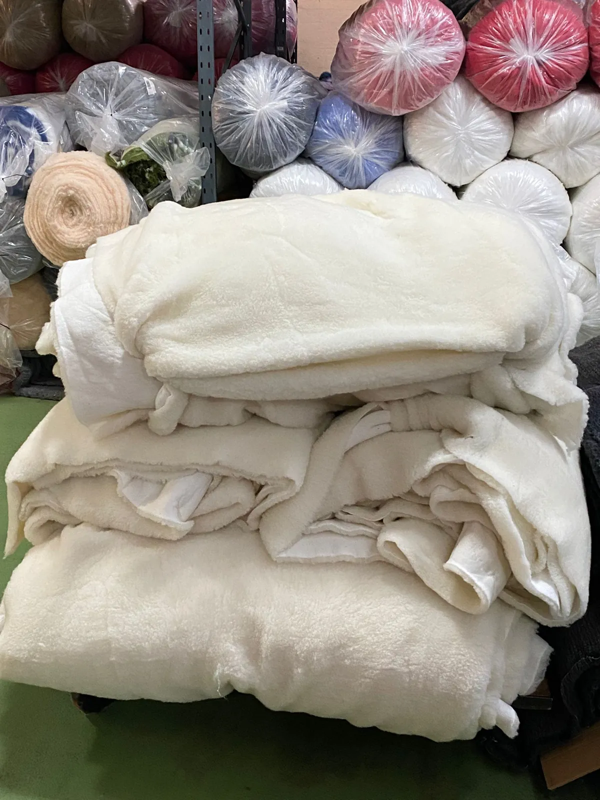 Folded undyed British wool pile fabric